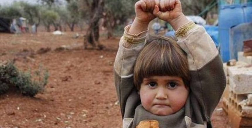 Heartbreaking-moment-a-four-year-old-Syrian-girl-surrendered-when-a-photographer-pointed-his-camera-at-her...-and-she-assumed-it-was-a-gun